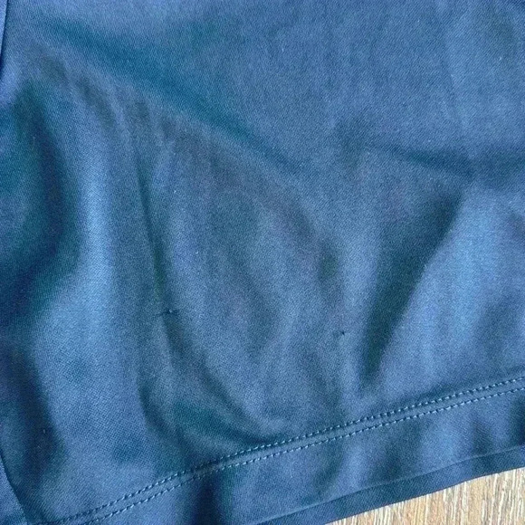 Nike shorts.  Boys size large. Listing is for both pairs.  Both are navy blue. - Picture 5 of 7